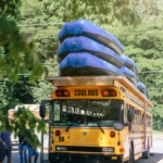 A bus carrying the rafts for the trip.