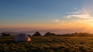 Tent campsite at sunrise
