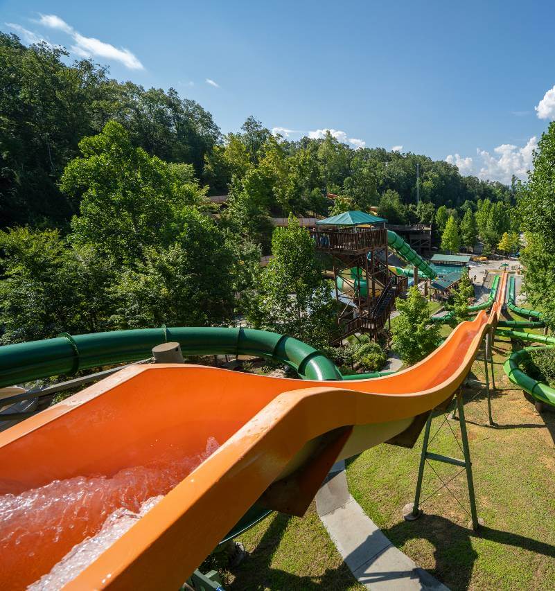 Family riding a water slide at Dollywood Splash Country