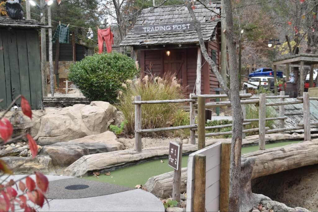 a wood bridge leads to the first hole at Ripley's Davy Crockett Mini-Golf